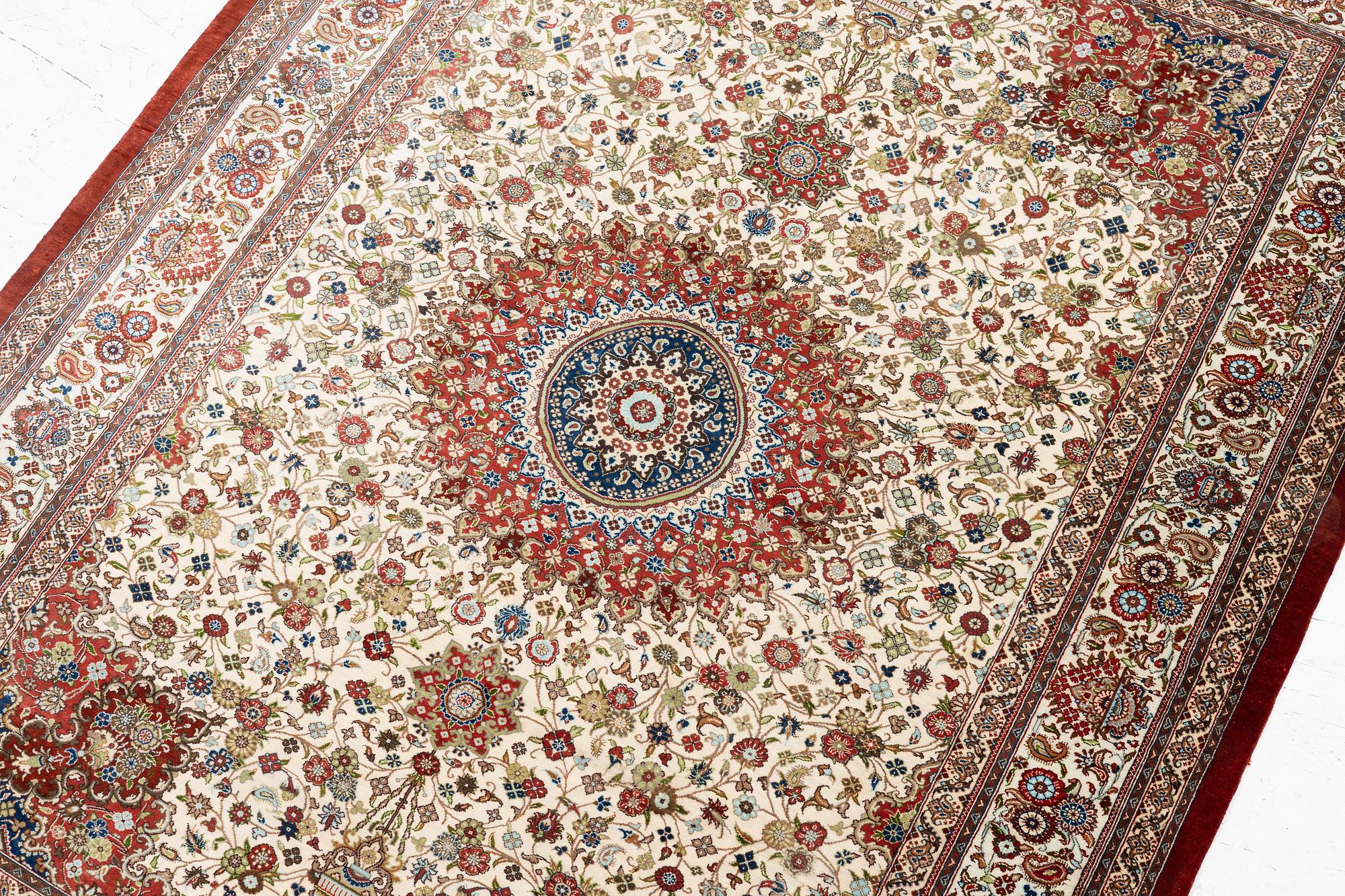 A silk Qum, Central Persia, signed Jashmedi c. 141 x 103 cm.