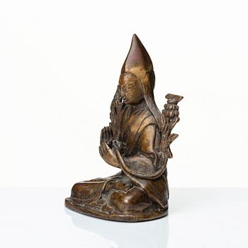 A Nepalese copper alloy figure of Tsongkapa, 20th Century.