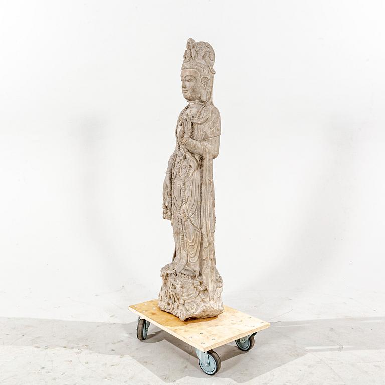 A stone sculpture of Boddhisattva, 20th Century.