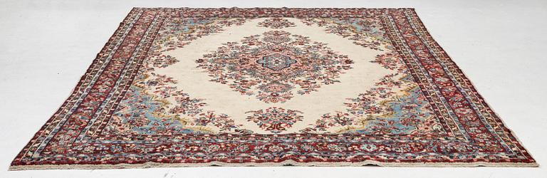 An oriental carpet, c. 370x260 cm.