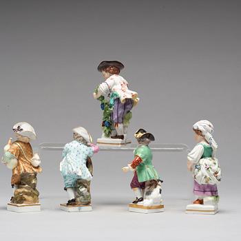 A group of five porcelain figurines of children, Meissen and Vienna.