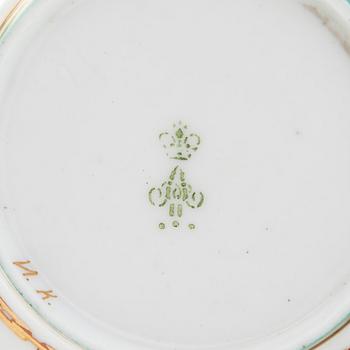 A cup and saucer from the Derzhava service, Imperial Porcelain Manufactory, St. Petersburg, late 19th century.