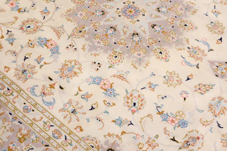 A Keshan carpet, approx. 300 x 206 cm.