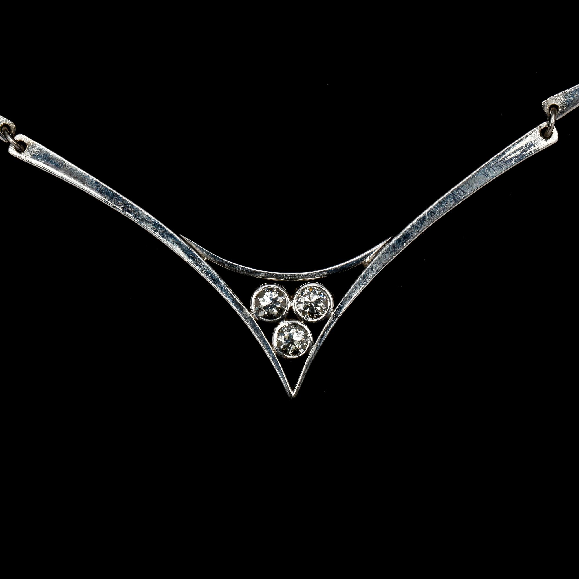 NECKLACE, three old cut diamonds, tot. app. 1.20 ct. Lantz, 1994.