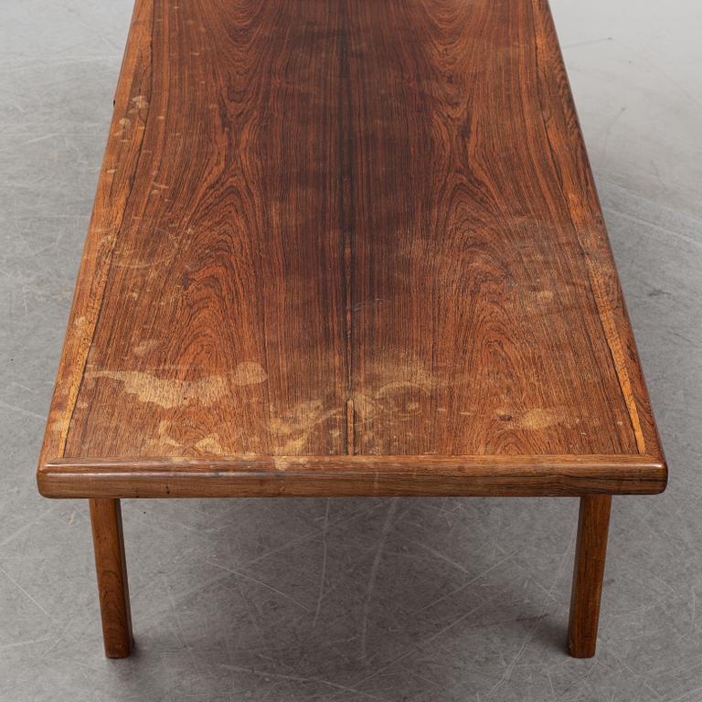 A 1950's/60's rosewood veneered coffee table.