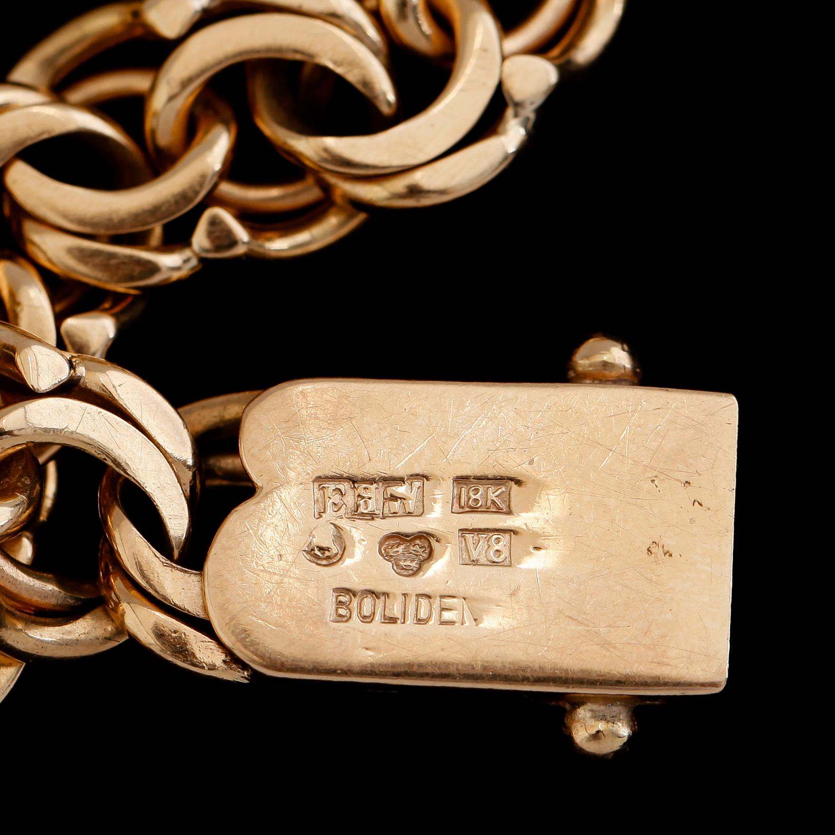 ARMBAND, 18 k guld, bolidenguld, 1947. Total vikt ca 31 g.