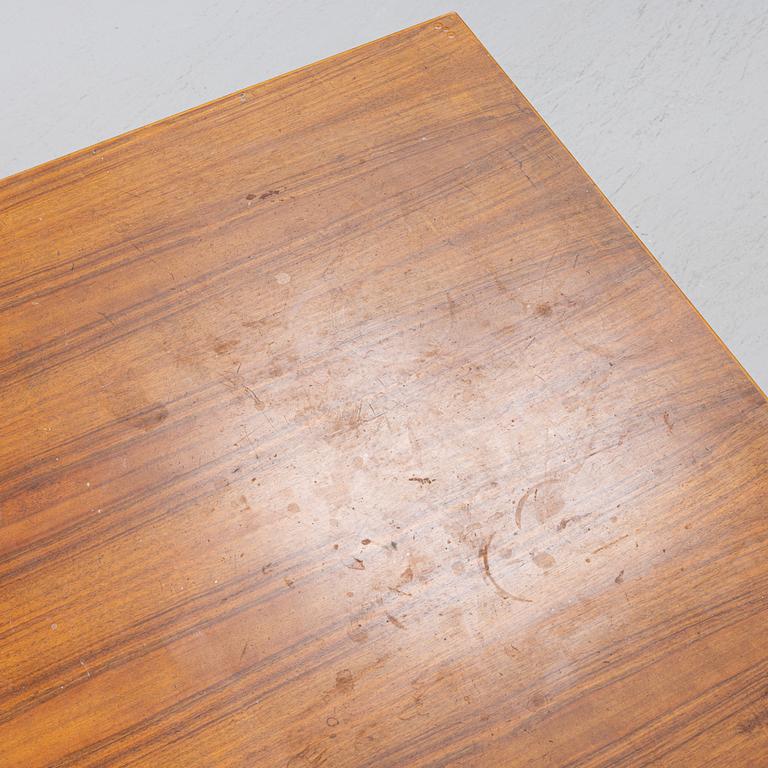 Florence Knoll, a model 590-036 walnut-veneered desk, by Nordiska Kompaniet in Sweden for Knoll International, 1962.