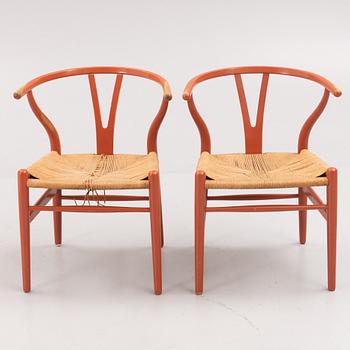 Hans J. Wegner, a pair of model 'CH-24' chairs, Carl Hansen & Søn, Denmark.