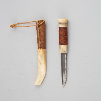 Lars Levi Sunna, a Sami reindeer horn knife, signed.