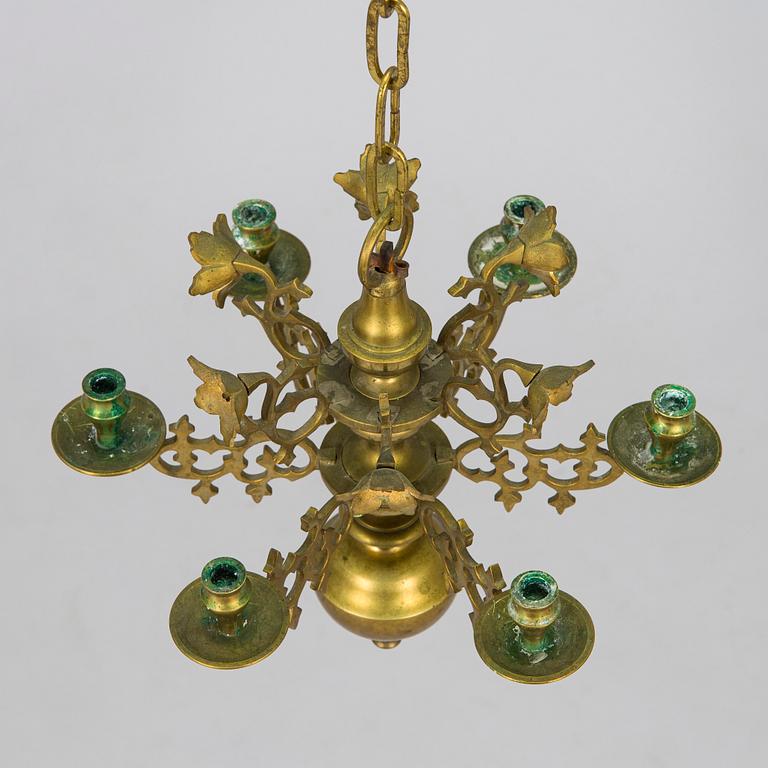 A brass candelabrum, first half of the 20th century.