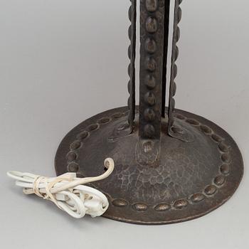 A early 20th century metal table light.