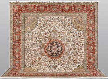 A part silk Tabriz carpet, sk 50 Radj, ca 312 x 296 cm.