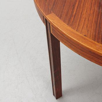 Bertil Fridhagen, a rosewood-veneered dining table with four chairs, BOdsfors, Sweden, 1960's.