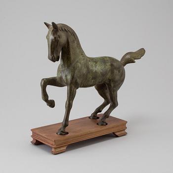 A late 20th century bronze sculpture.