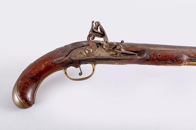 An 18th Century flintlock pistol.