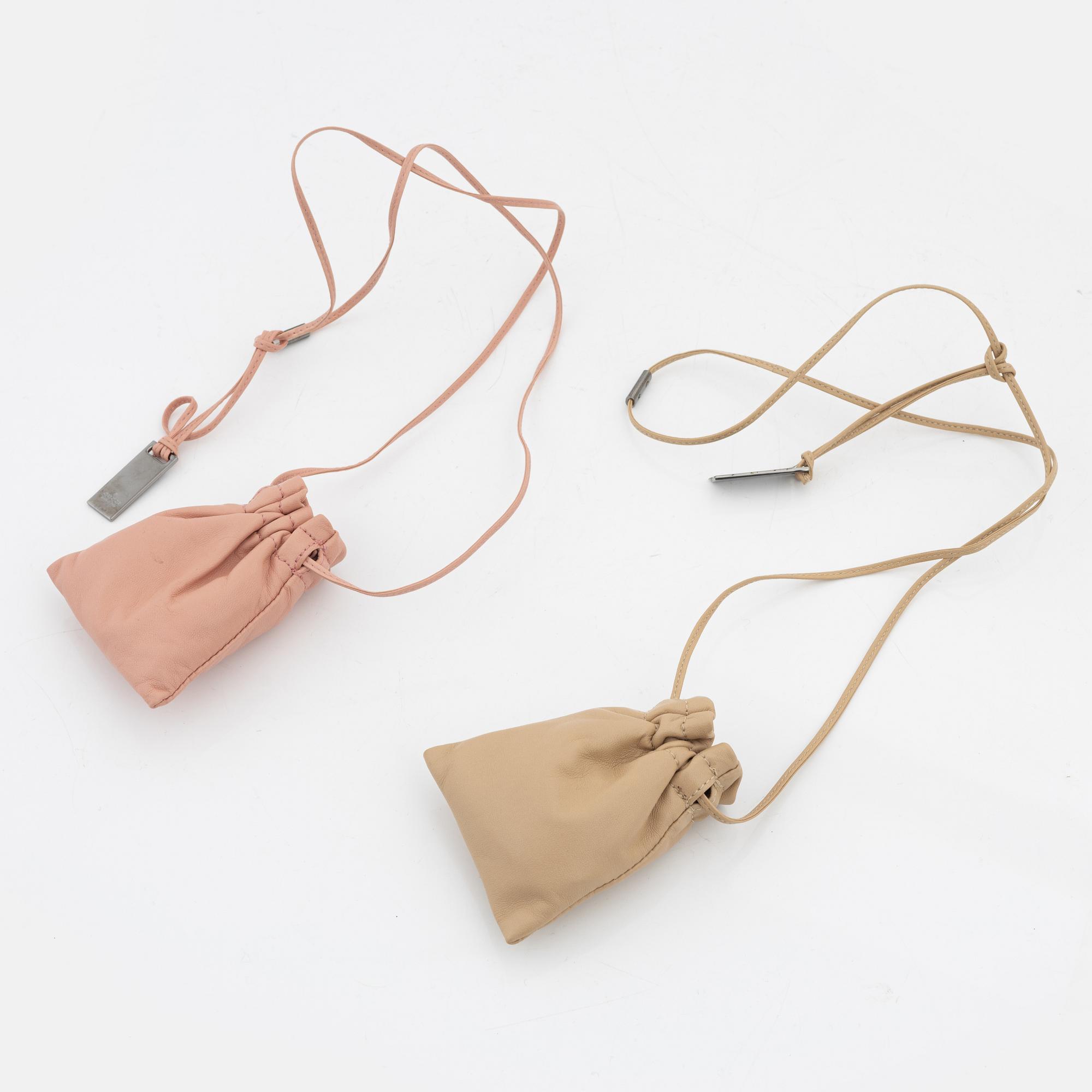 Gucci, a par of collarbags in pink and beige leather.