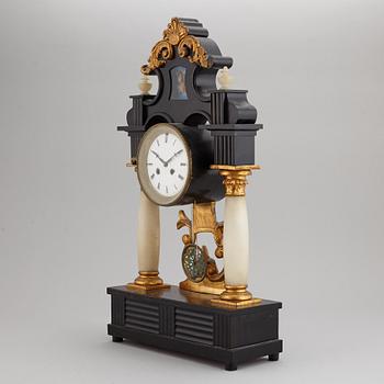 A late Empire table clock, mid 19th Century.