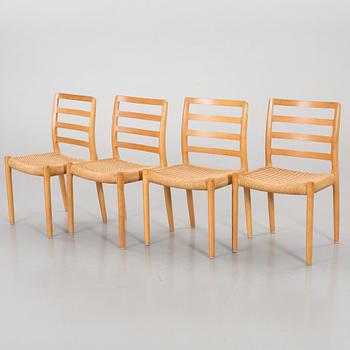 A SET OF 4 CHAIRS AND A TABLE BY Niels O Möller.