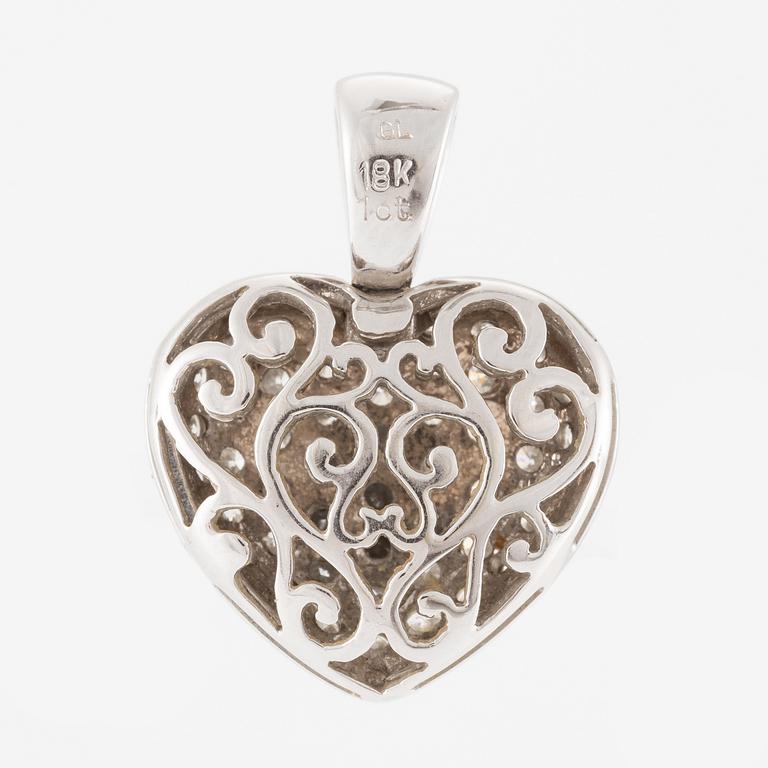 Pendant in the shape of a heart, 18K gold with round brilliant-cut diamonds.