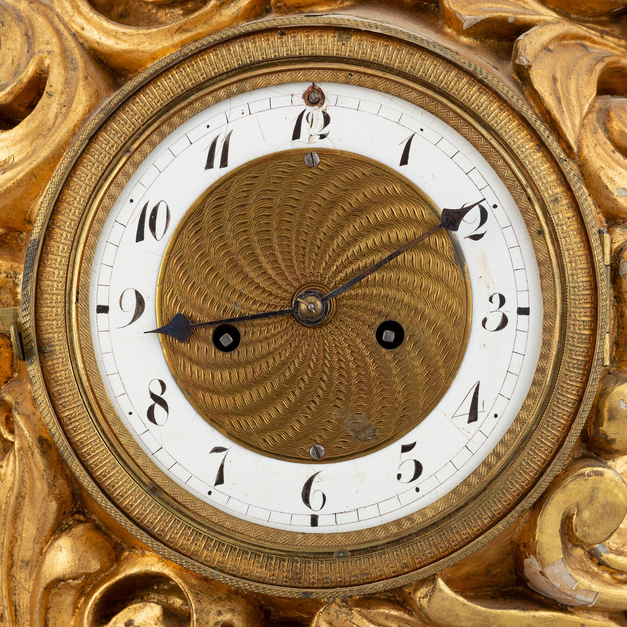 A rococo style table clock, 19th Century.