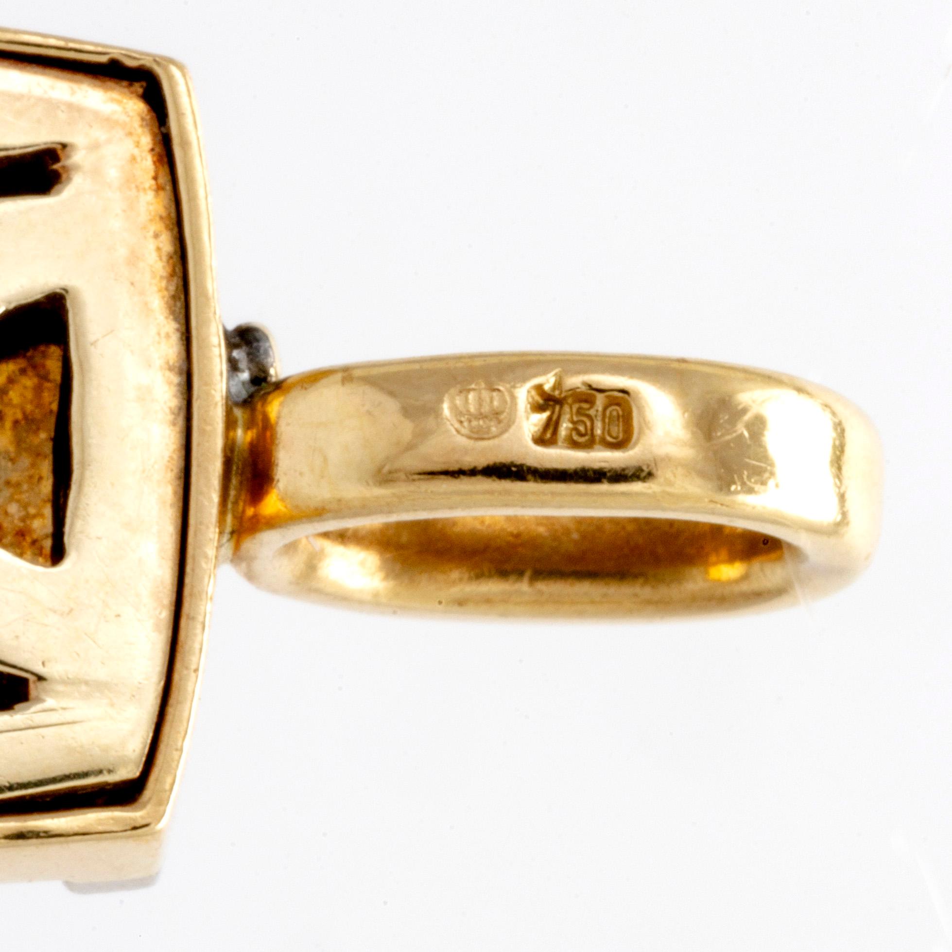 Hänge i form av ett kors, 18K guld, cabochonslipade stenar och åttkant- samt gammalslipade diamanter.