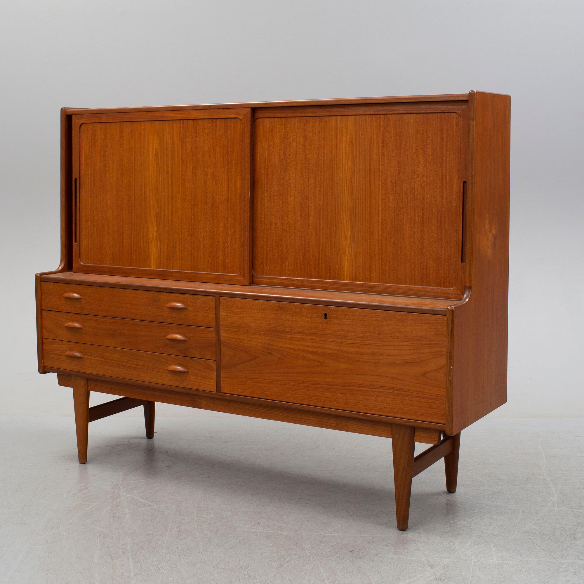 A teak veneered cabinet, 1960's.