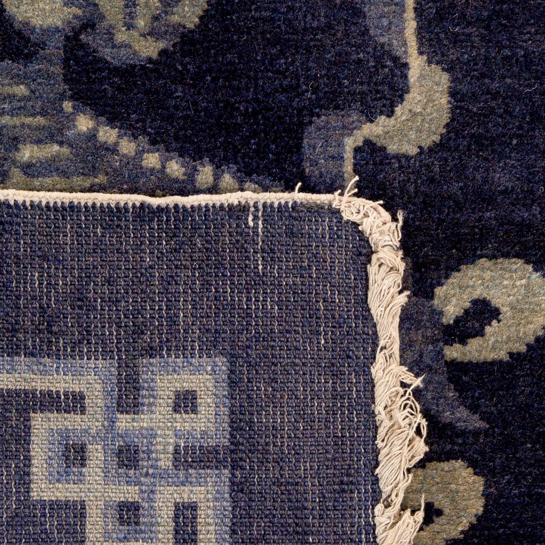 A semainatique Chinese Baotou carpet ca 120x65 cm.