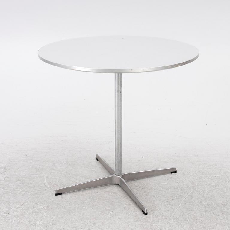 Arne Jacobsen, A coffee table, by Fritz Hansen, dated 2000.