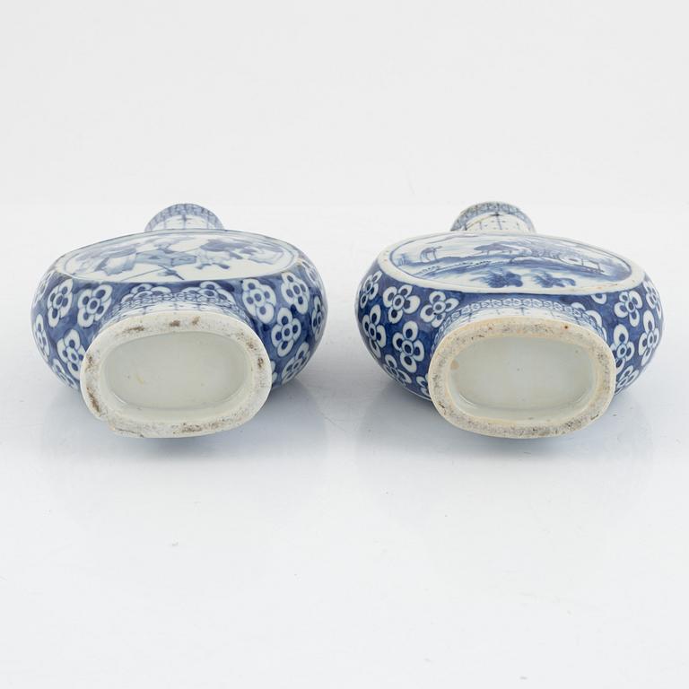 Two blue and white porcelain moon flasks, China, 19th century.