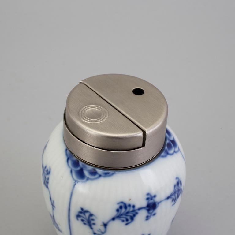 A pair of porcelain candlesticks and a lighter from Royal Copenhagen, Denmark.