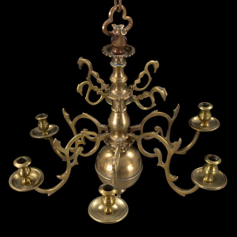 A baroque brass chandelier, first half of 18th century. Height (ink chain) 70 cm.