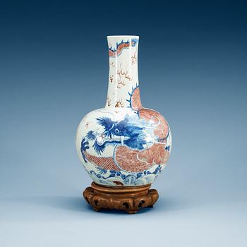 1580. An underglaze blue and red vase with a four clawed dragon, Qing dynasty, 18th Century.