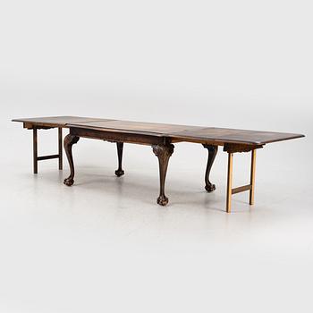 A birch dining table, first half of the 20th century.