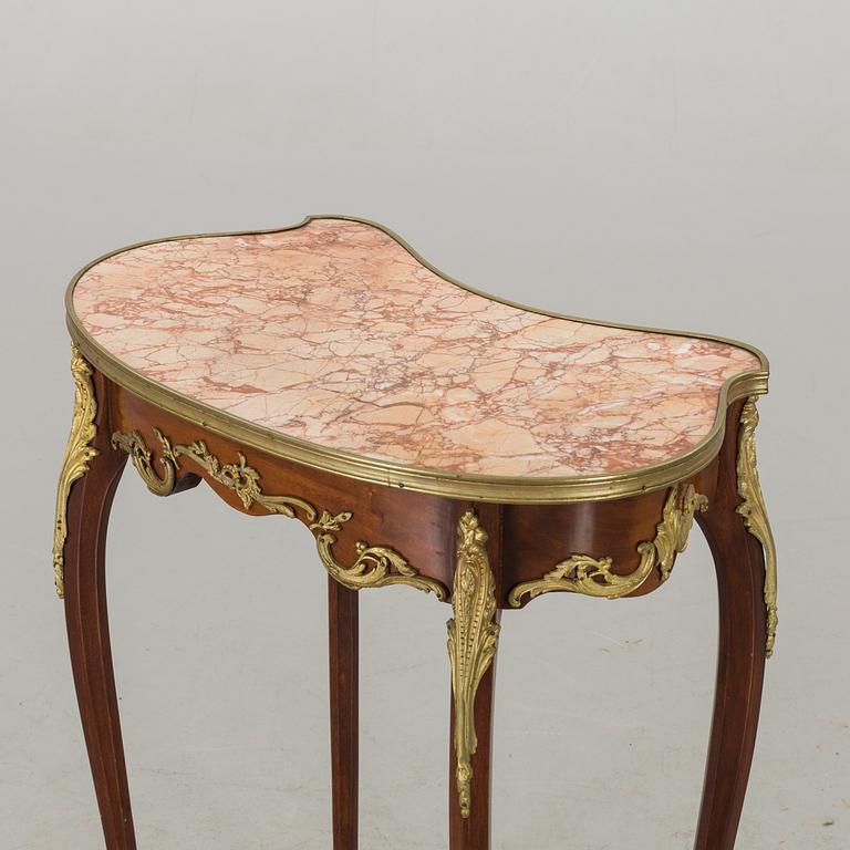 A NEO ROCOCO SIDE TABLE.