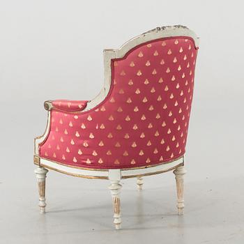 A LOUIS XVI STYLE BERGERE, 20th century.