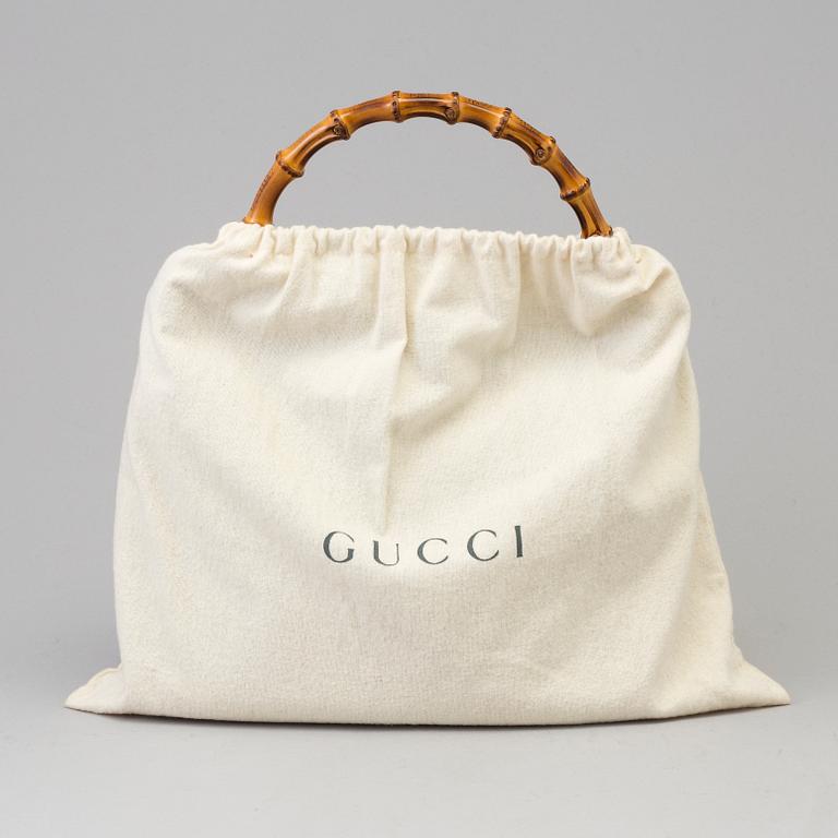 A Gucci leather bag.