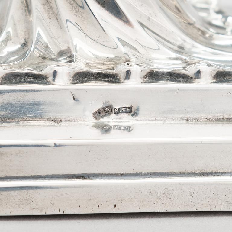 Two pairs of silver candlesticks, England 1889 and Finland 1975.