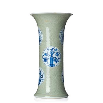 A Chinese blue and white celadon-ground beaker vase, Qing dynasty, Kangxi (1662-1722).