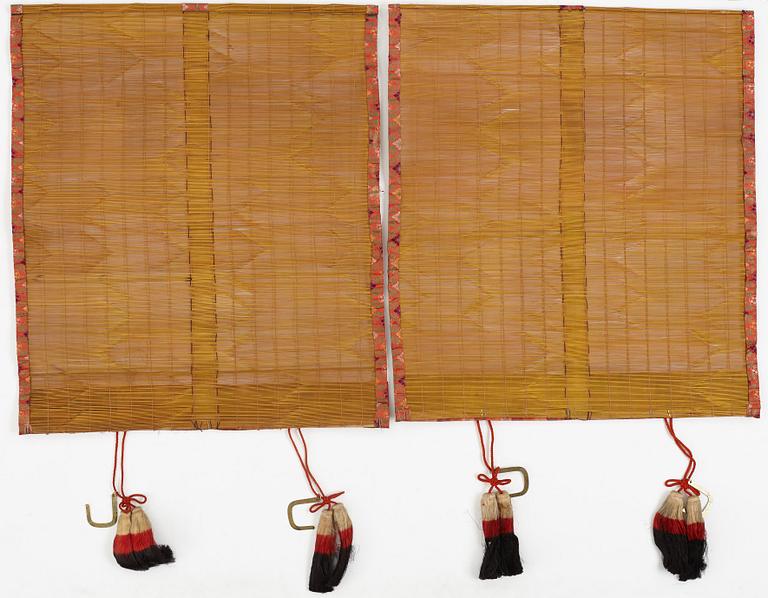 Two Japanese curtains and a wooden panel, 20th Century.