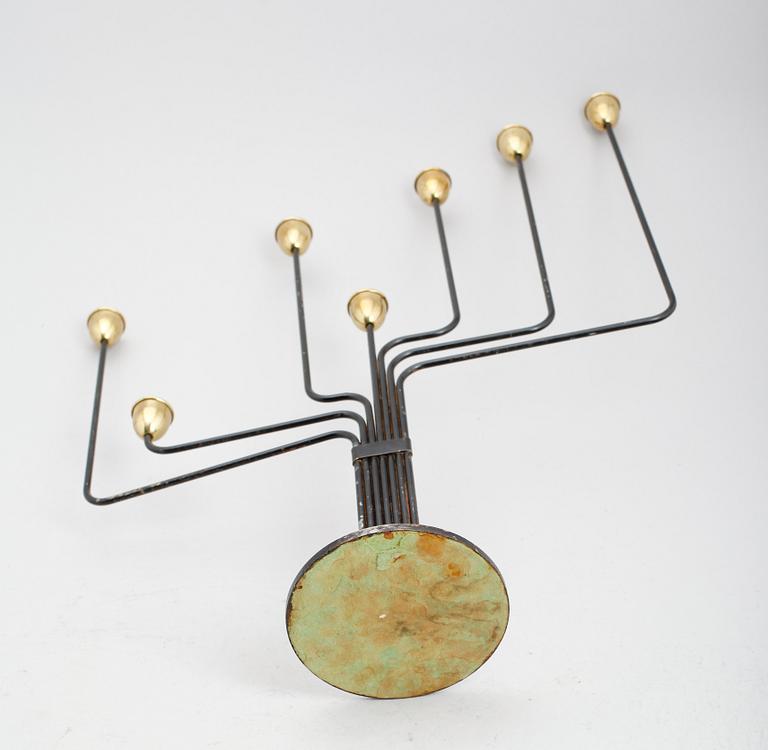 A Piet Hein brass and black lacquered metal candelabrum, 1950's-60's.