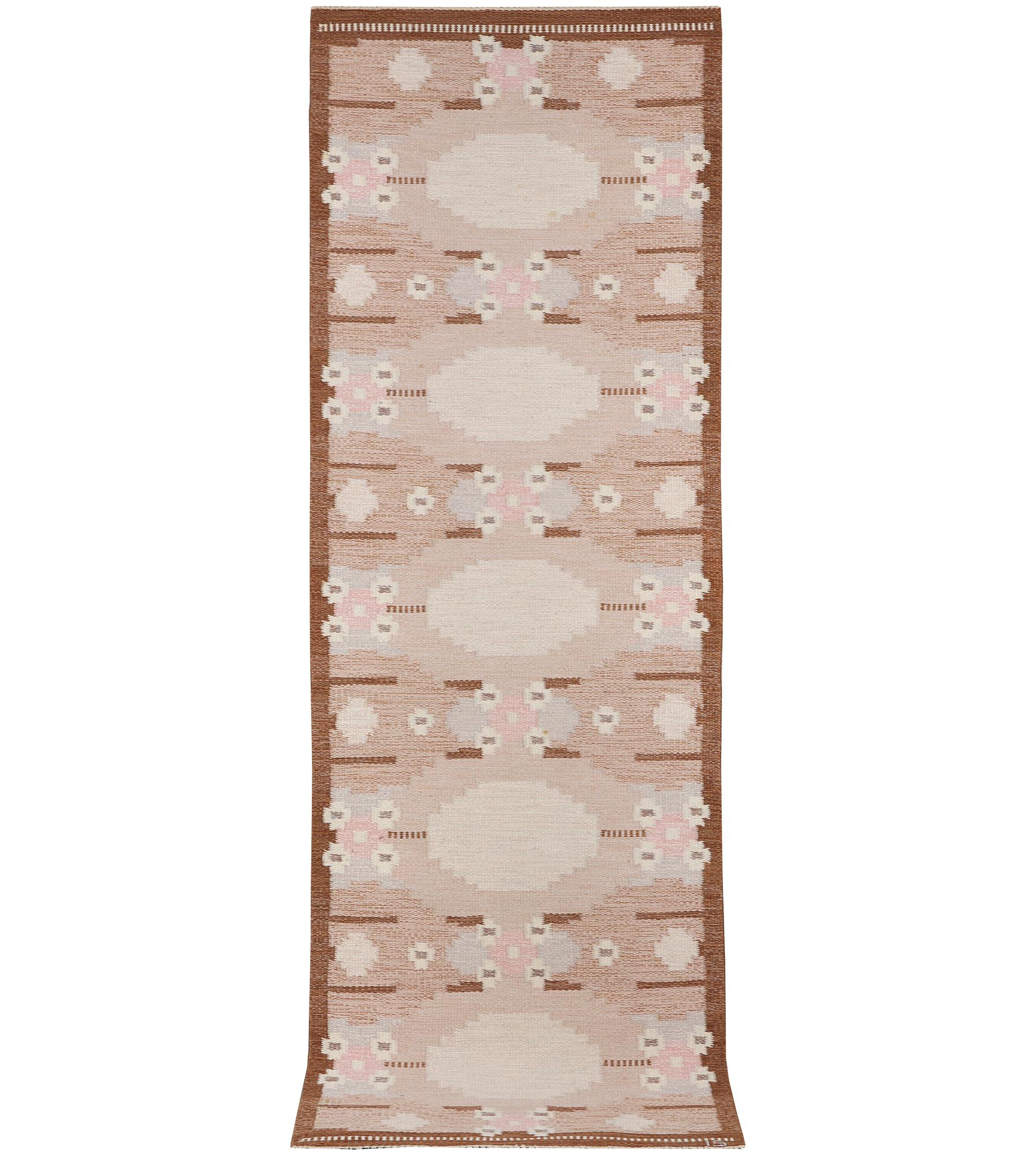 Ingegerd Silow, a flat weave runner carpet, signed IS, c. 262 x 82 cm.