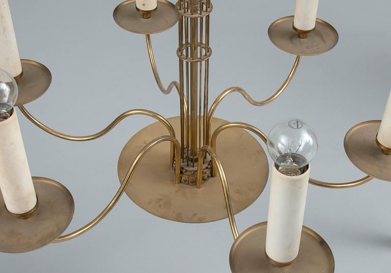 Paavo Tynell, A SIX LIGHT CHANDELIER. Design Paavo Tynell.