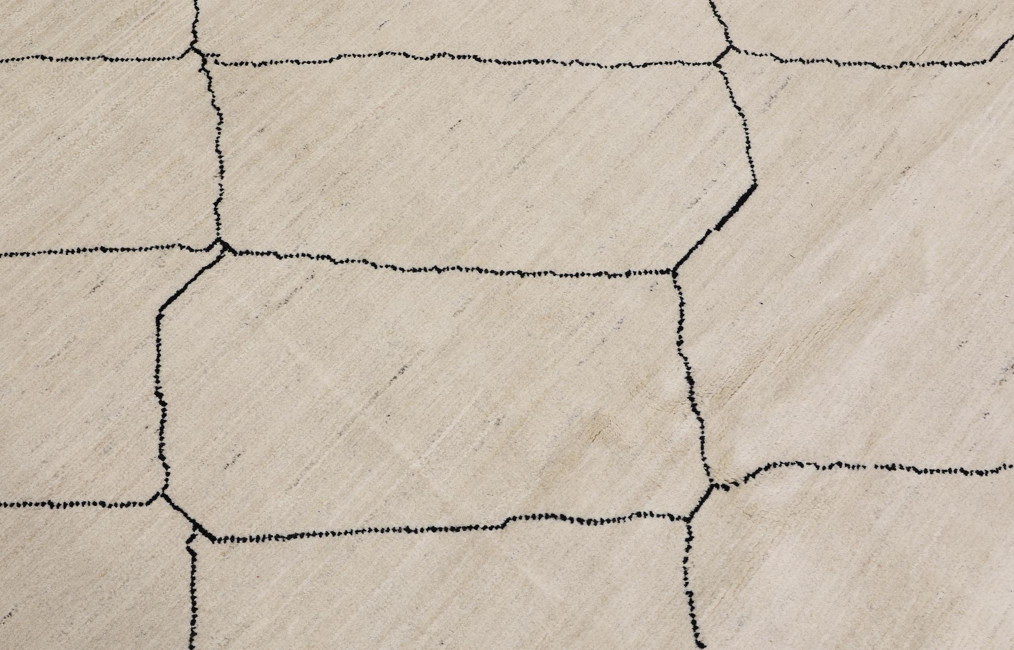 A Moroccan carpet, 305 x 251 cm.