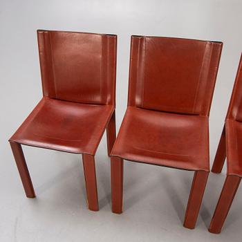 A set of four Matteo Grassi leather chairs alter part of the 20th century.