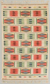 A CARL DANGEL FLAT WEAVE RUG, signed CD, 223x140 cm.