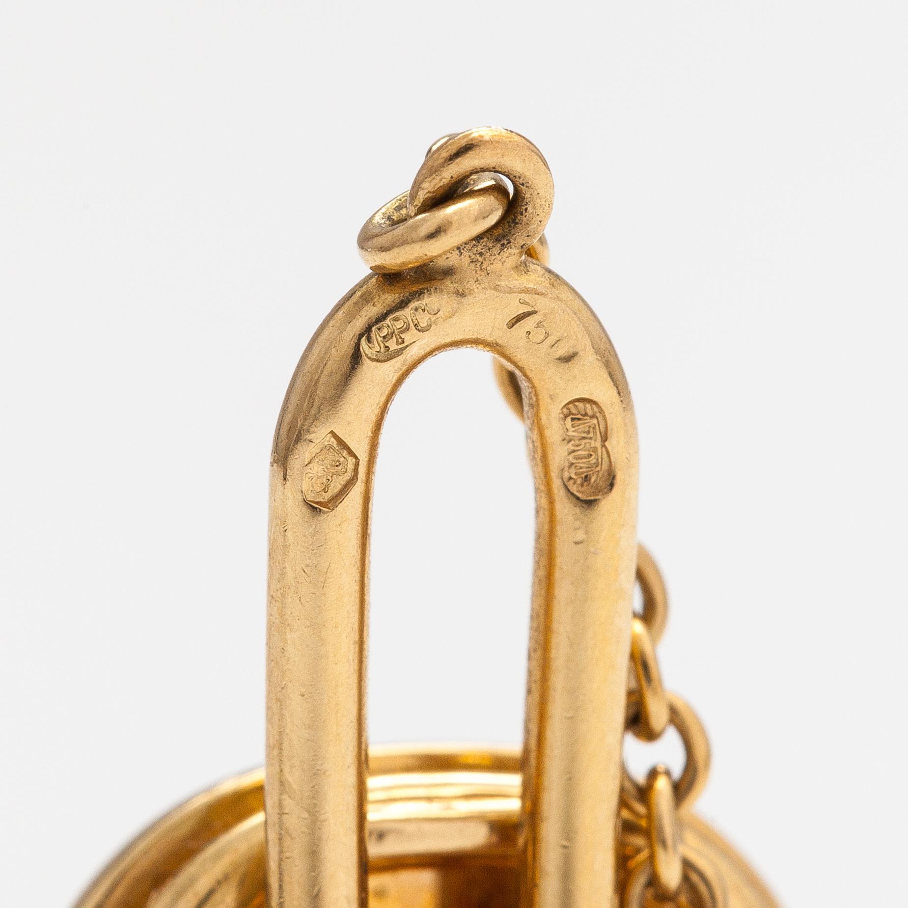 Patek Philippe, Manschettknappar och slipsnål "Ellipse Calatrava", 18K guld och safiglas. Märkta Patek Philippe Geneve.