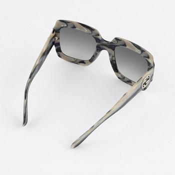 Gucci, a pai of sunglasses, 2016.