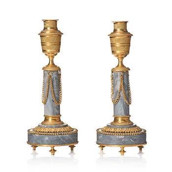 A pair of Louis XVI ormolu and marble cassolettes, late 18th century.