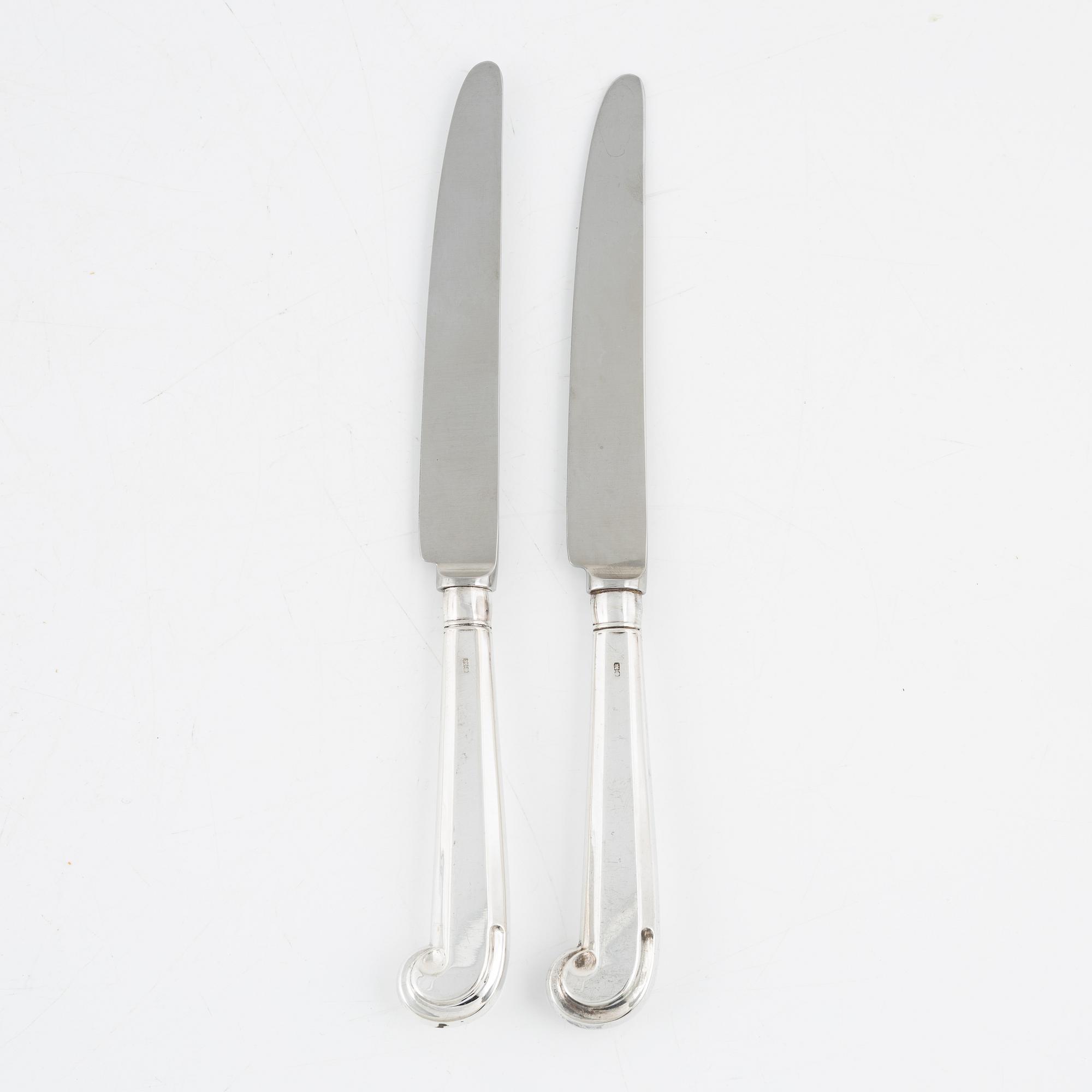 A set of English Silver Pistol Grip Knives, mark of Strickett & Loder, Sheffield 1987 (12 pieces).