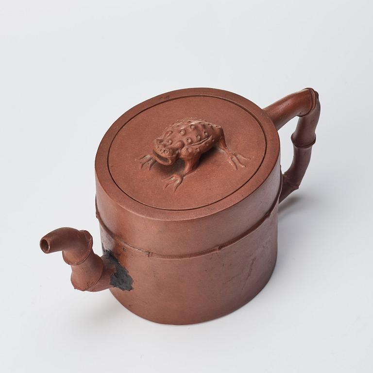 A Yixing tea pot with cover, Qing dynasty, 18th Century.